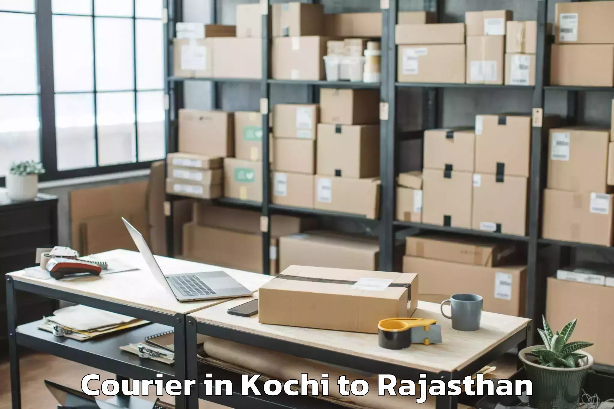 Reliable Kochi to Civil Airport Raj Courier